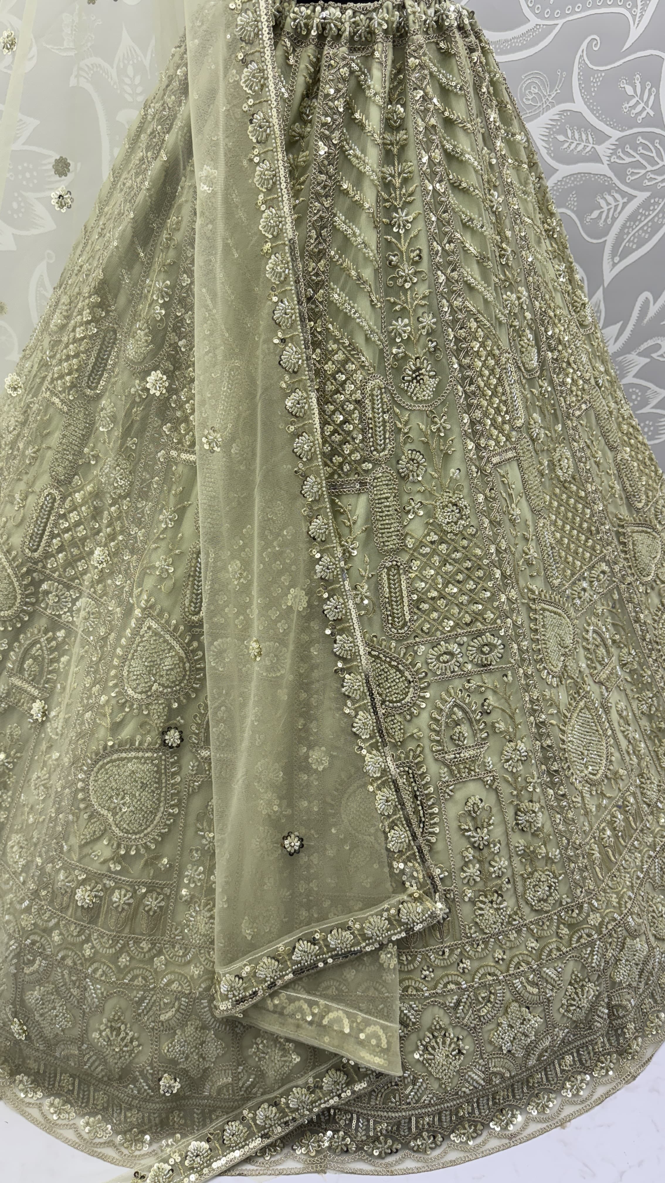 Sober Handwork Pastel Green Motif and Crystal Pipe work Designed Reception Wear Collection in Lehenga Choli